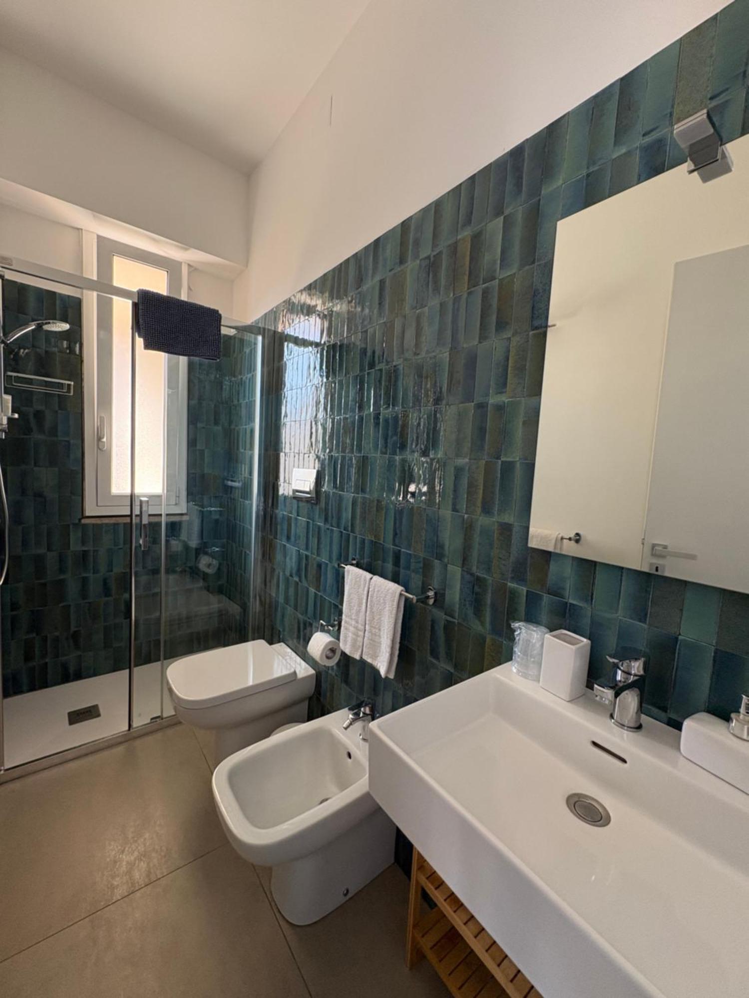 Camera Standard Doppia con Letti Singoli con Bagno in Comune